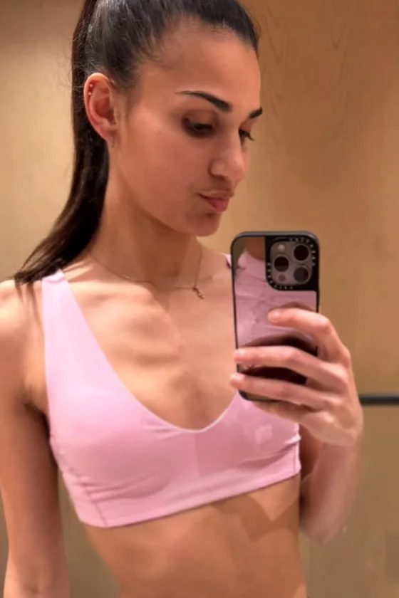 The same person wearing icy pink